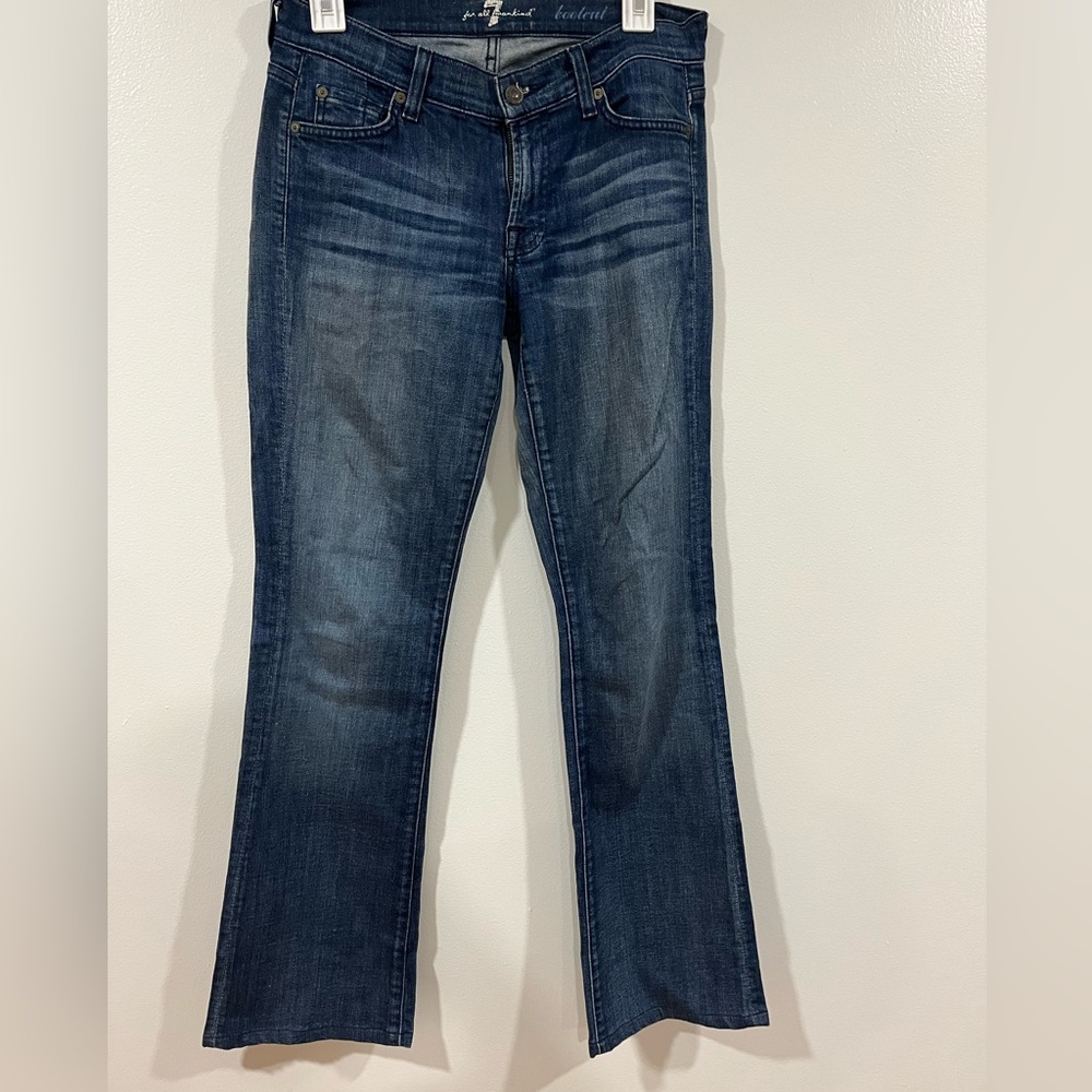 7 for all mankind medium wash, boot cut jeans. Size 27